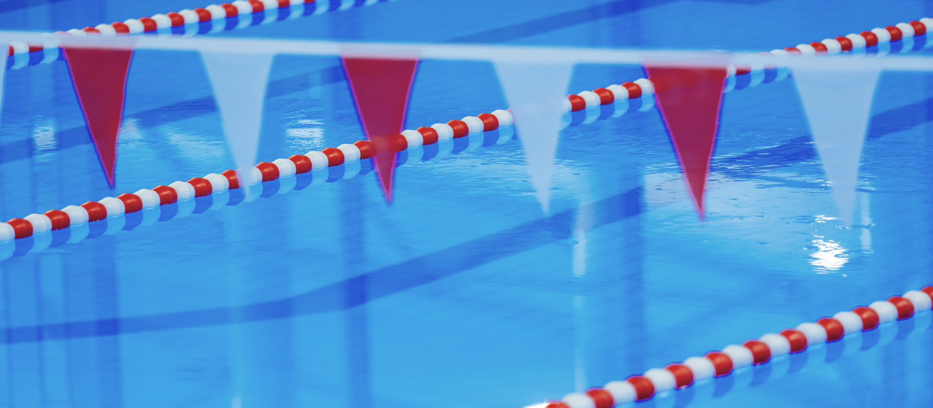 Sportbecken im Mona Mare Monheim am Rhein mit Schwimmbahnen, rot-weißen Leinen und Startfähnchen